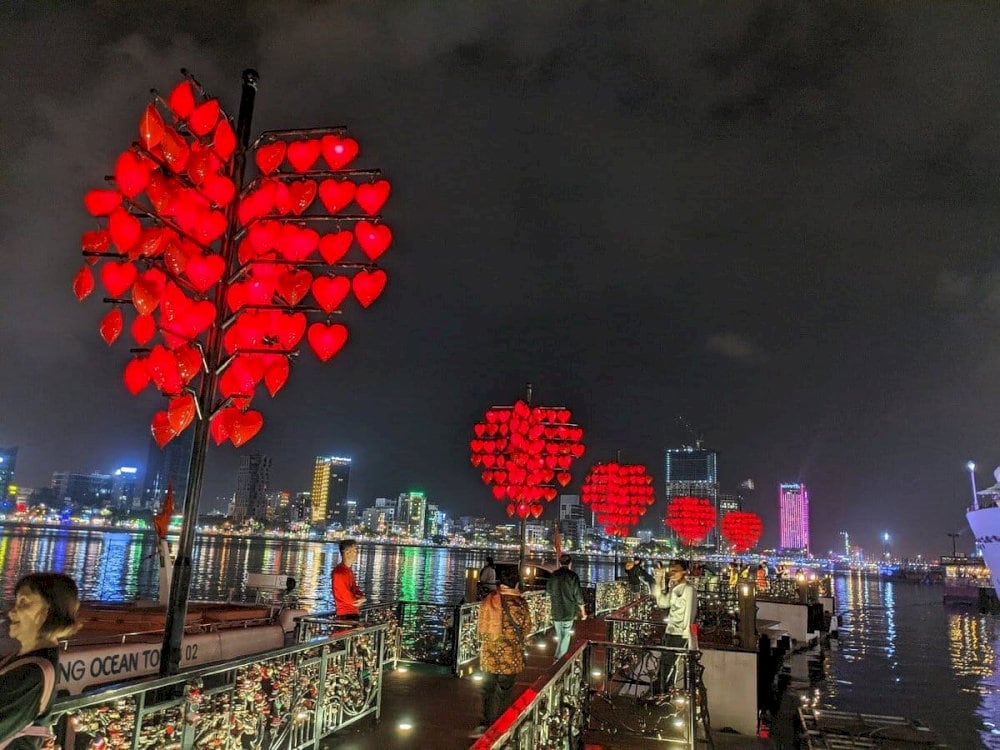 The heart-shaped lanterns shine brightly as night falls